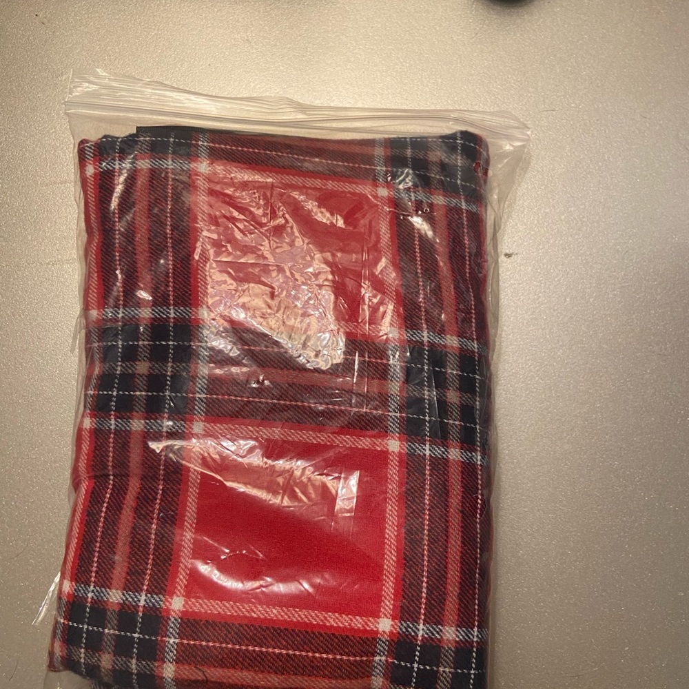 Size 10 dog puffer coat red and black pajama/christmas’s theme